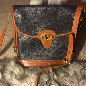 Dooney & Bourke all leather purse.